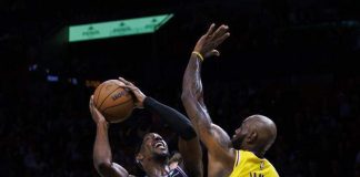 LeBron iguala récord de Parish y Doncic fulmina al Heat con 60 puntos